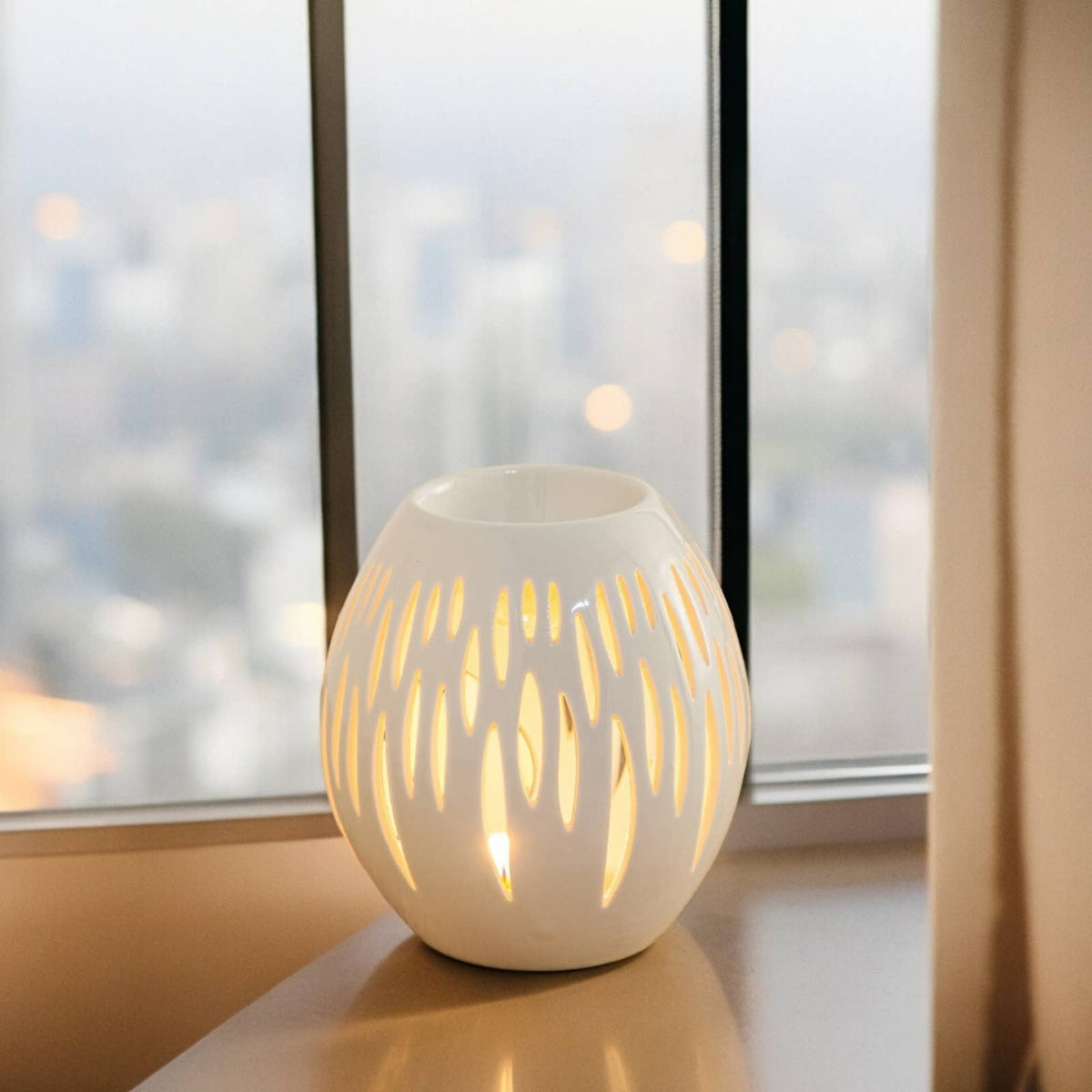 🕯️ Quemador de Cerámica Óvalo Blanco – Luz, Aroma y Calidez