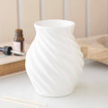 Quemador de aromas Espiral · Cerámica blanca